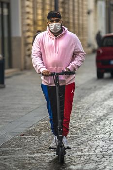 terni,italy november 24 2020:man with mono skate inside the city