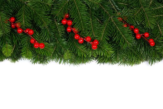 Fir Christmas tree branches and holly berries isolated on white background flat lay top view mock-up