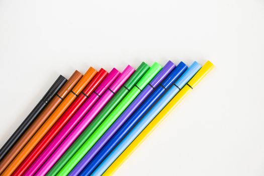 Colorful markets gradient on the white background, markers for painting and drawing, multicolored