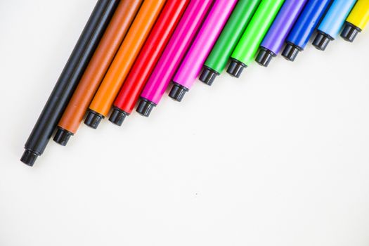 Colorful markets gradient on the white background, markers for painting and drawing, multicolored