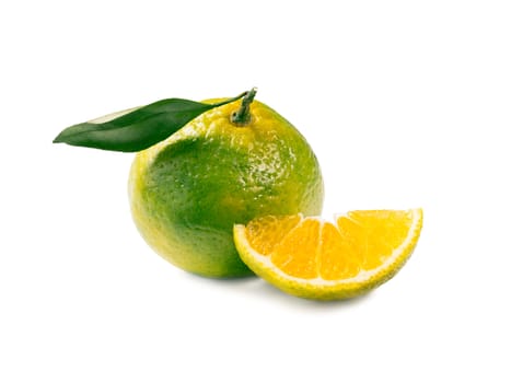 Green mandarines isolated on white background. Perfect fresh ripe green tangerine with leaf and slice green tangerine isolated on white with clipping path.