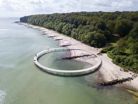 Aarhus, Denmark - June 9, 2019: Aerial drone view of the Infinity Bridge, a work of art by architect Niels Povlsgaard and Johan Gjoedes.