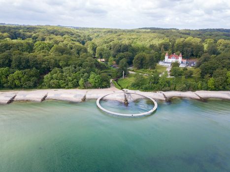 Aarhus, Denmark - June 9, 2019: Aerial drone view of the Infinity Bridge, a work of art by architect Niels Povlsgaard and Johan Gjoedes.