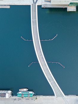 Copenhagen, Denmark - August 27, 2019: Aerial drone view of the new modern pedestrian and cycling bridge Lille Langebro.