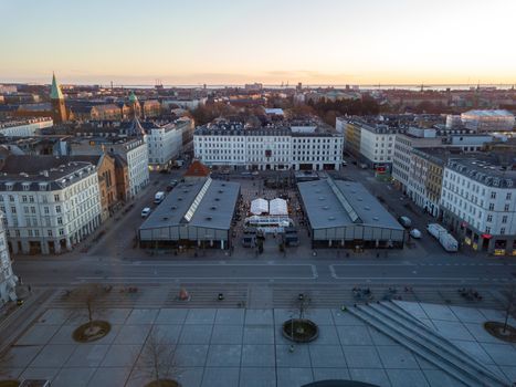 Copenhagen, Denmark - March 31, 2020: Aerial drone view of Torvehallerne, a popular modern market place.