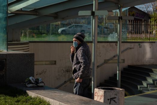 11-22-2020. Prague, Czech Republic. People during quarantine period due to coronavirus (COVID-19) at Hradcanska metro stop in Prague 6. Homeless.