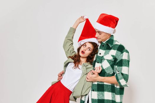 Man holds woman friendship rest fun New year holiday studio. High quality photo