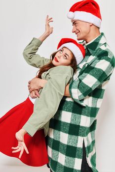 Man and woman support holiday emotions fun fashion. High quality photo