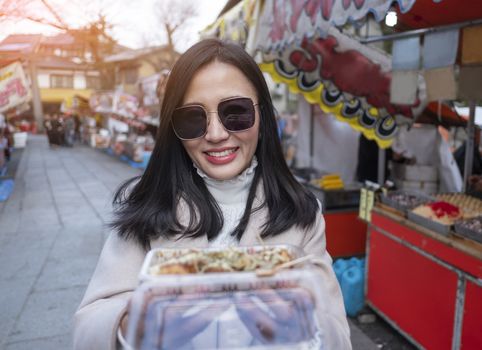 Takoyaki japanese food on the street to Fushimi Inari shrine at Kyoto,Japan.