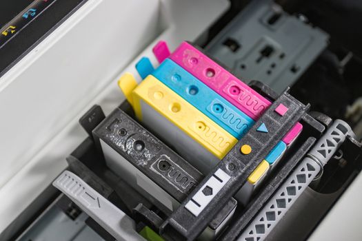 An ink cartridge or inkjet cartridge is a component of an inkjet printer that contains the ink four color