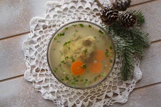 Fish aspic in portioned transant bowl, flat view