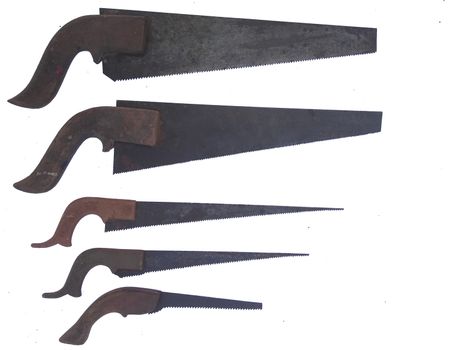 image of Different sizes of old hand saw isolated on white background.