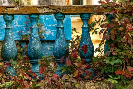 Blue stone railings on the porch of the palace. Balustrades in autumn