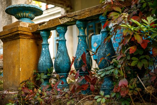 Blue stone railings on the porch of the palace. Balustrades in autumn