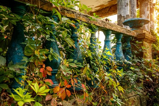 Blue stone railings on the porch of the palace. Balustrades in autumn