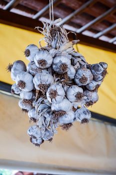 garlic clove braid hanging in the air on the island of Crete