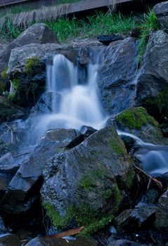 A small waterfall, photographed on a long exposure.