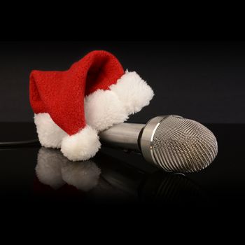 A Christmas Santa hat with a microphone for singing during the holidays.
