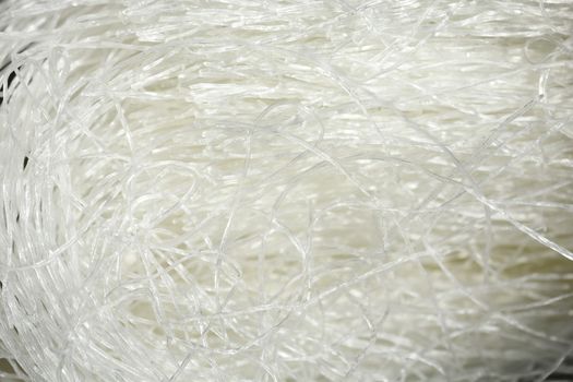 Close up of dry uncooked glass noodles