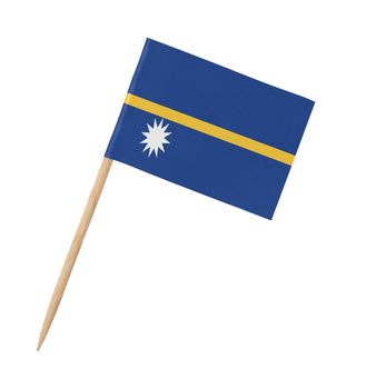 Small paper flag of Nauru on wooden stick, isolated on white