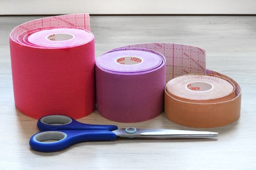 Kinesiological tape rolls. Anti-pain taping for athletes for weight loss, anti-wrinkle.