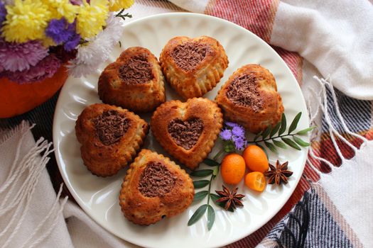 Sweet dish in the shape of a heart and sprinkled with grated chocolate