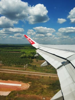 The view from the airplane window to the ground. Landscape view from the sky.