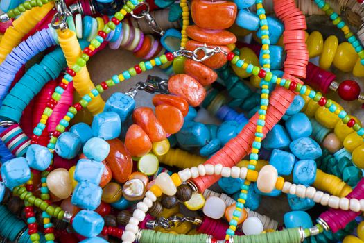 Colorful necklaces and bracelet mix, large group of beads and stone necklace, jewelry background