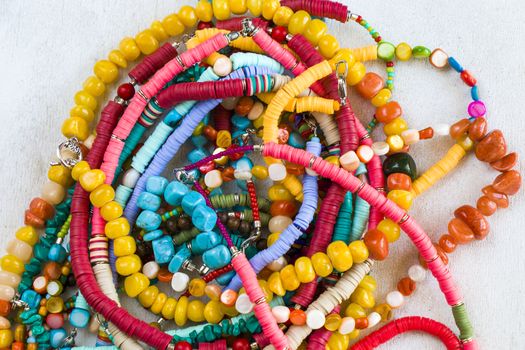 Colorful necklaces and bracelet mix, large group of beads and stone necklace, jewelry background