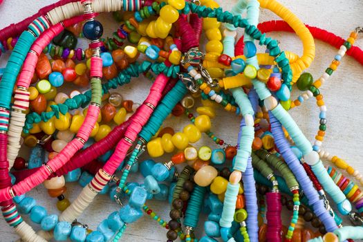 Colorful necklaces and bracelet mix, large group of beads and stone necklace, jewelry background