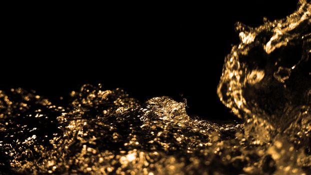 Hi speed close up images of oil liquid from diesel gasoline splashing and moving up to the air on black background for represent power of fuel liquid that active and powerful. studio shot premium gold color tone.