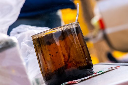 Transparent mug with tea. Brewing tea in a bag.