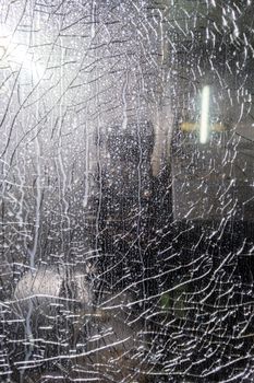 broken protective glass of cnc lathe - close-up full frame photo.