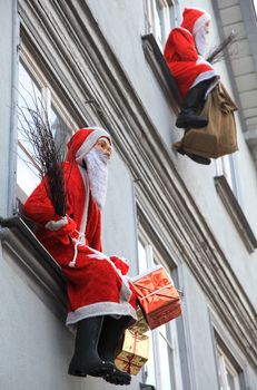 Artificial Santa Claus on house facade