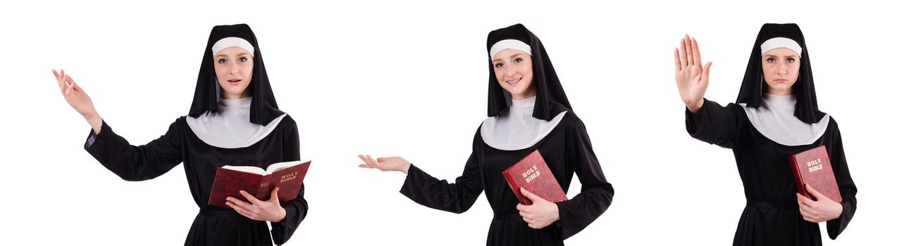 Young nun with bible isolated on white