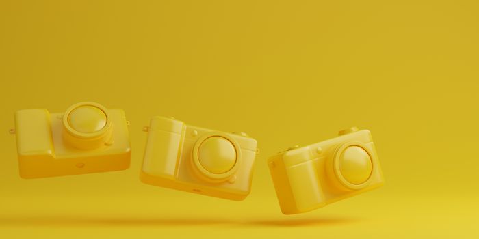 Yellow digital camera on yellow background, technology concept. 3d rendering