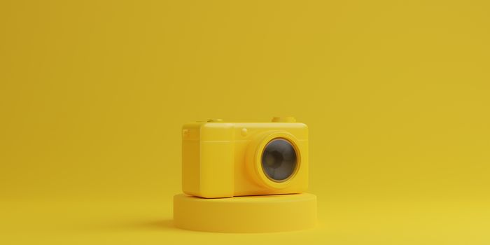 Yellow digital camera on yellow background, technology concept. 3d rendering