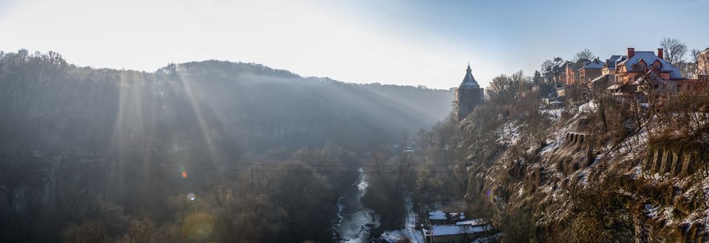 Kamianets-Podilskyi, Ukraine 01.07.2020. Smotrytsky canyon and river around the Kamianets-Podilskyi fortress on a sunny winter morning