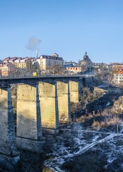 Kamianets-Podilskyi, Ukraine 01.07.2020. Novoplanovsky bridge over the Smotrytsky canyon in Kamianets-Podilskyi on a sunny winter morning