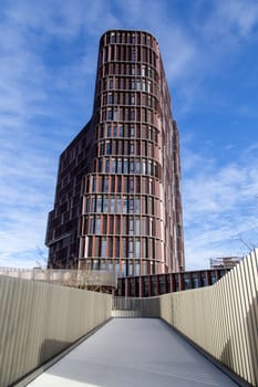 Copenhagen, Denmark - February 12, 2019: Facade of the Maersk Tower, a research facility and an extension of Panum, the university's Faculty of Health and Medical Sciences.