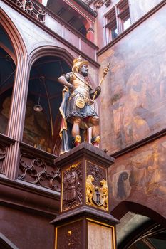 Basel, Switzerland - March 10, 2019: Statue of the founder of Basel Lucius Munatius Plancus in the courtyard of the town hall created in 1580 by Hans Michel.