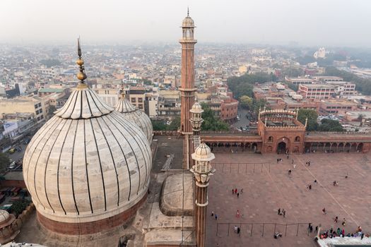 Delhi, India - December 04, 2019: Aerial view of Jama Masjid from one of the minaret towers.