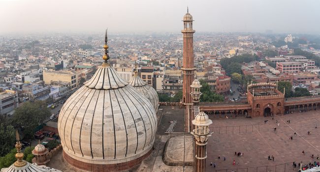 Delhi, India - December 04, 2019: Aerial view of Jama Masjid from one of the minaret towers.