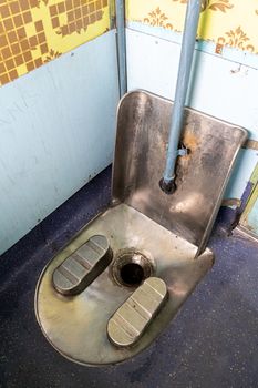 Jodhpur, India - December 8, 2019: An Indian style toilet on an Indian train