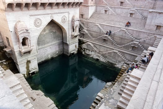 Jodhpur, India - December 8, 2019: The historic stepwell Toorji Ka Jhalra in the historic city centre.