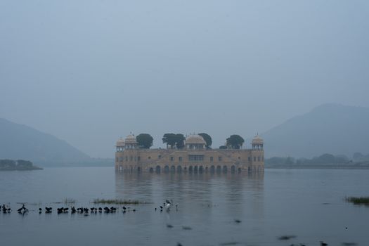 Jaipur, India - December 12, 2019: The Water Palace Jal Mahal on a foggy morning.