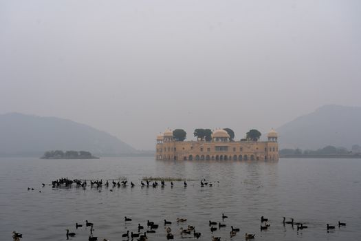 Jaipur, India - December 12, 2019: The Water Palace Jal Mahal on a foggy morning.