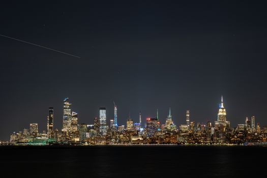 New York City, United States - September 18, 2019: Midtown Manhattan skyline at night. View from Jersey City.