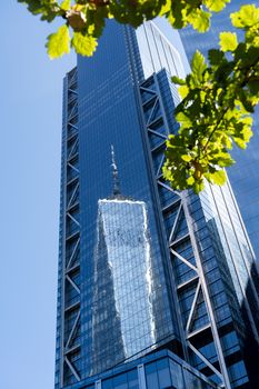 New York, United States of America - September 19, 2019: Reflection view of the One World Trade Center in Lower Manhattan.