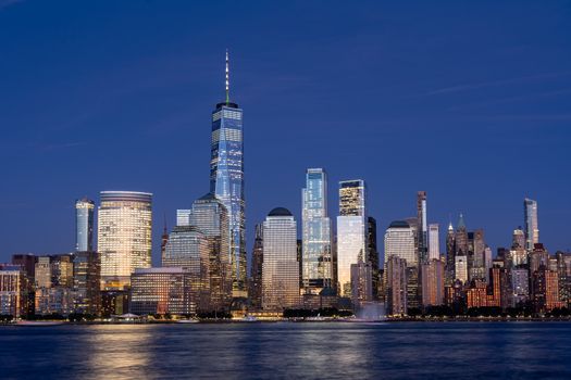 New York City, United States - September 18, 2019: Lower Manhattan skyline at night. View from Jersey City.